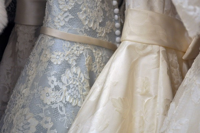 wedding dresses on rack