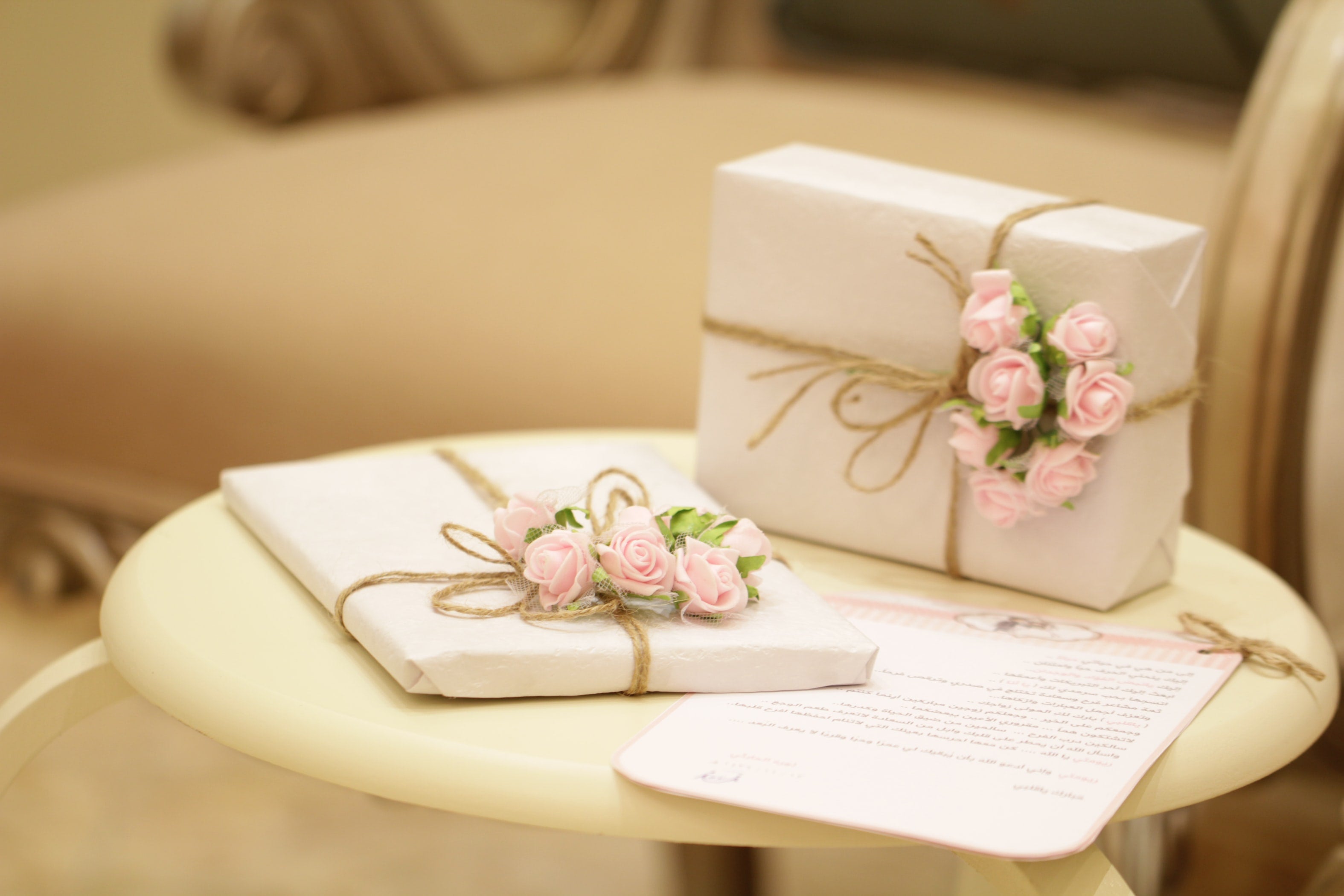 wedding gifts on table with registry list