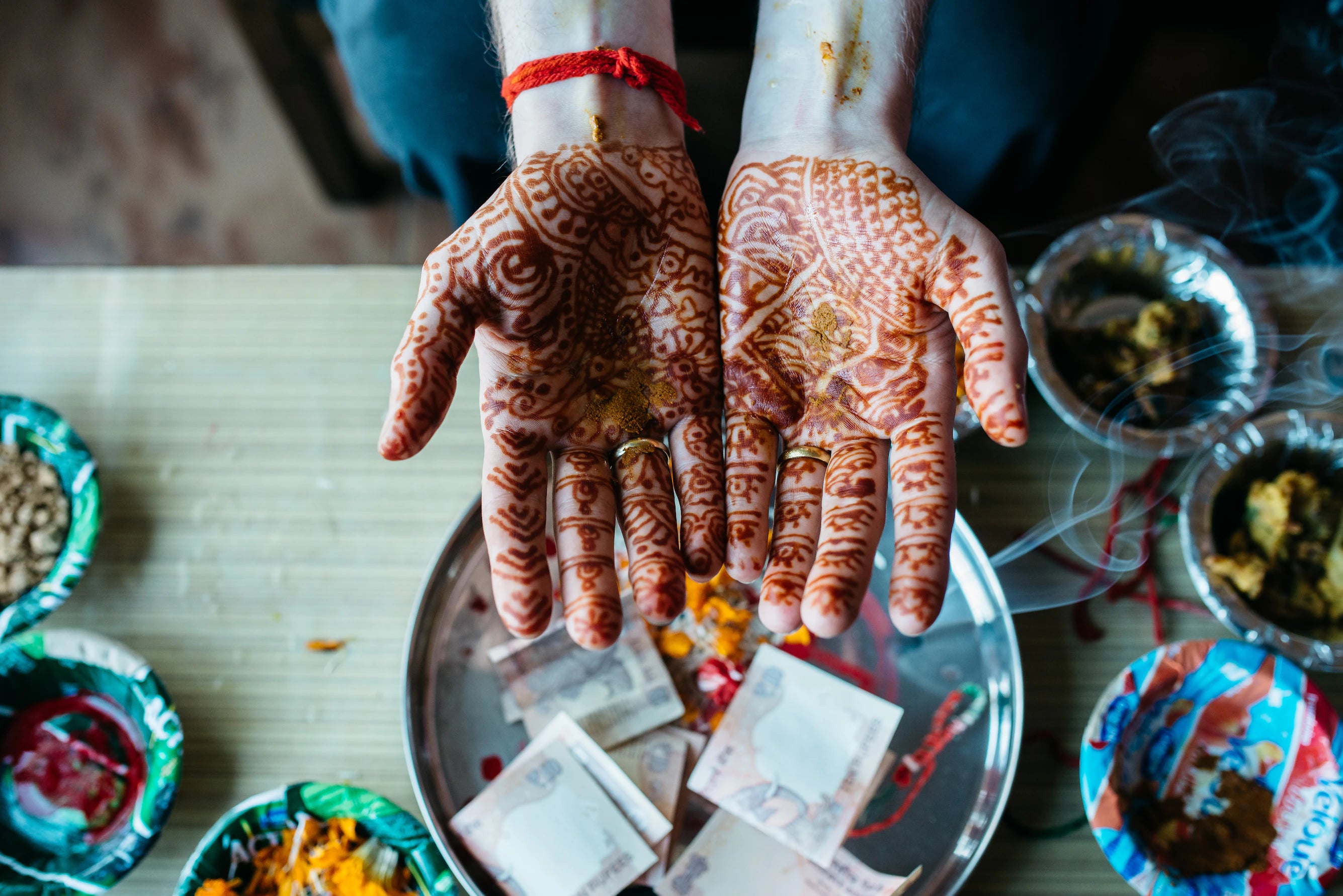 woman with henna on her hands