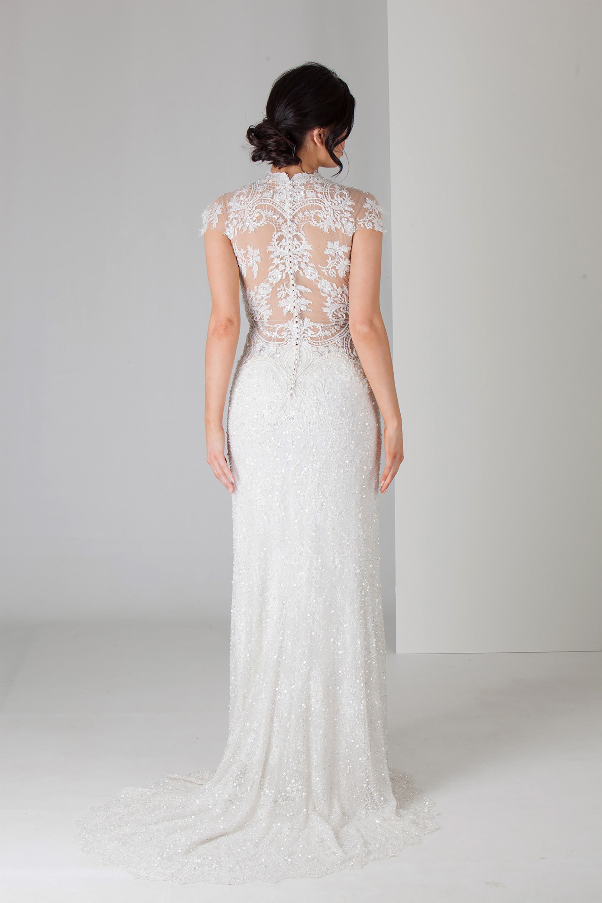 beaded lace wedding gown with fitted skirt and cap sleeved top