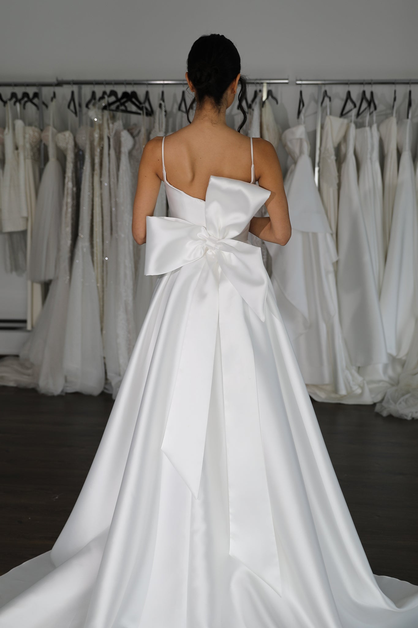 bridal gown with flowing mikado skirt and knotted bow