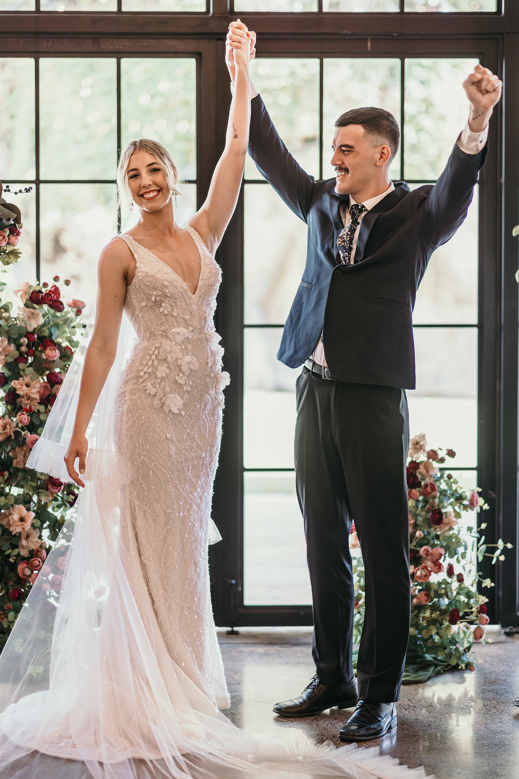 bride and groom celebrating after tying the knot