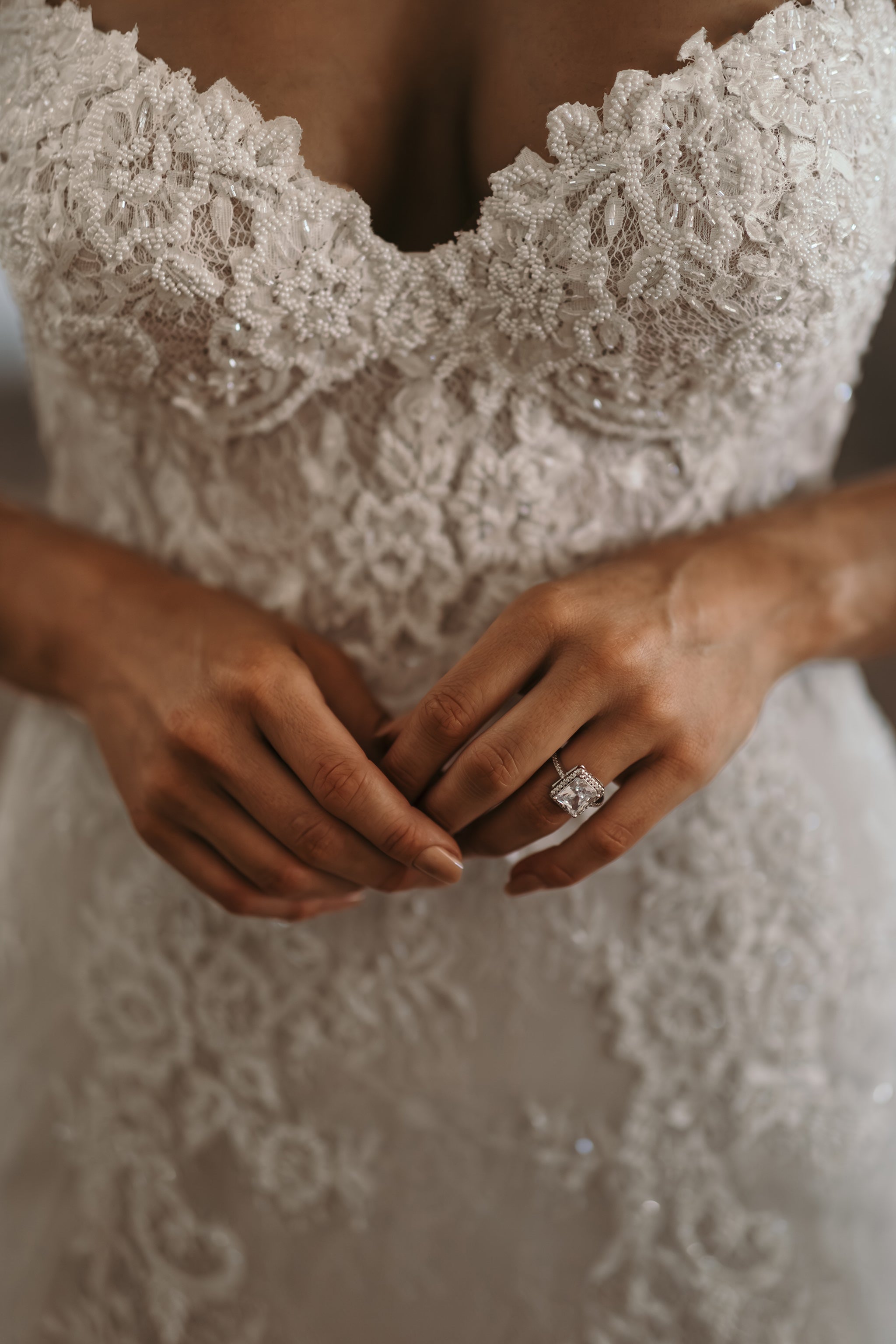 close up of bridal gown lace bodice