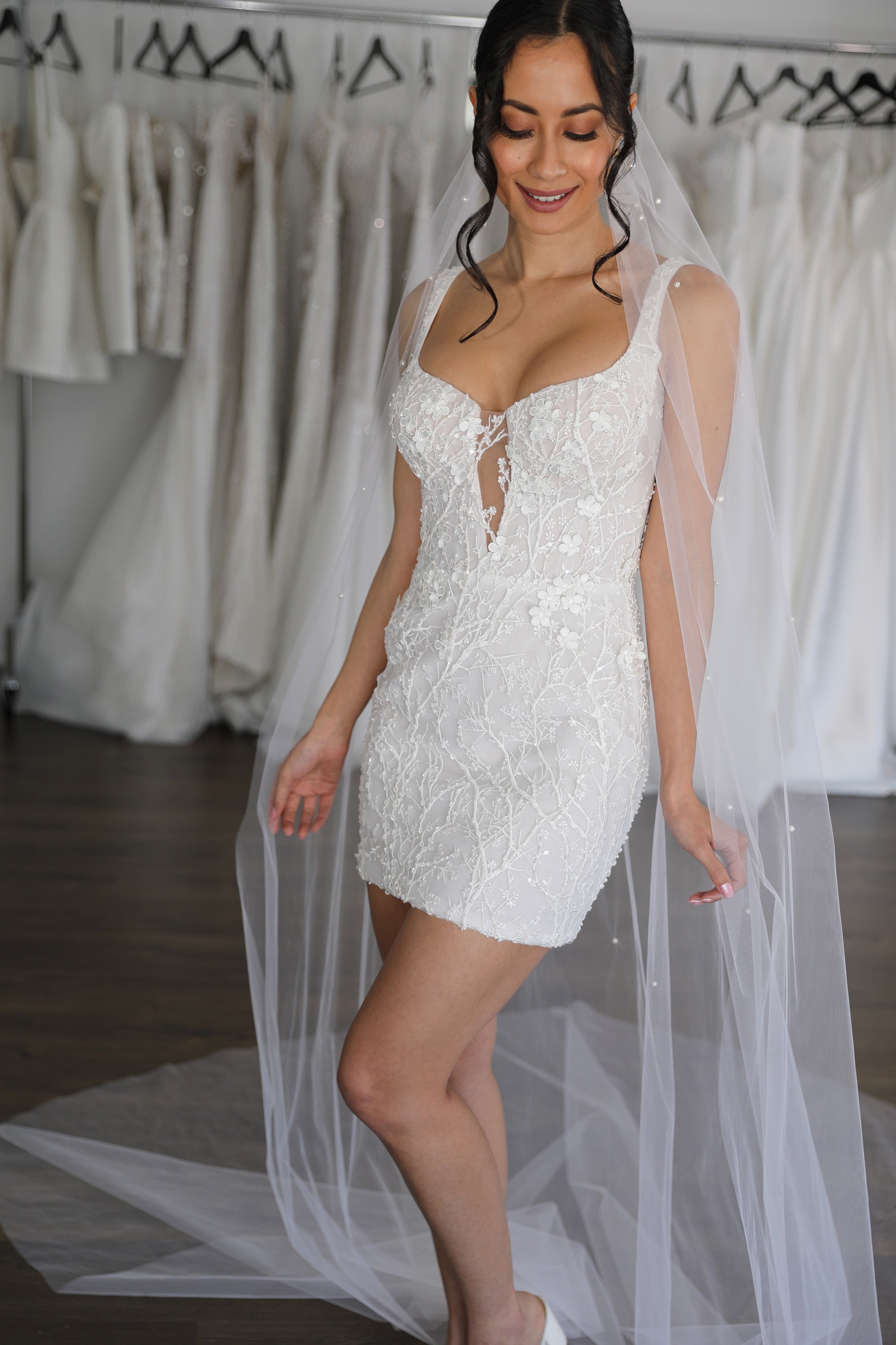 deep v-neck wedding mini and pearl veil