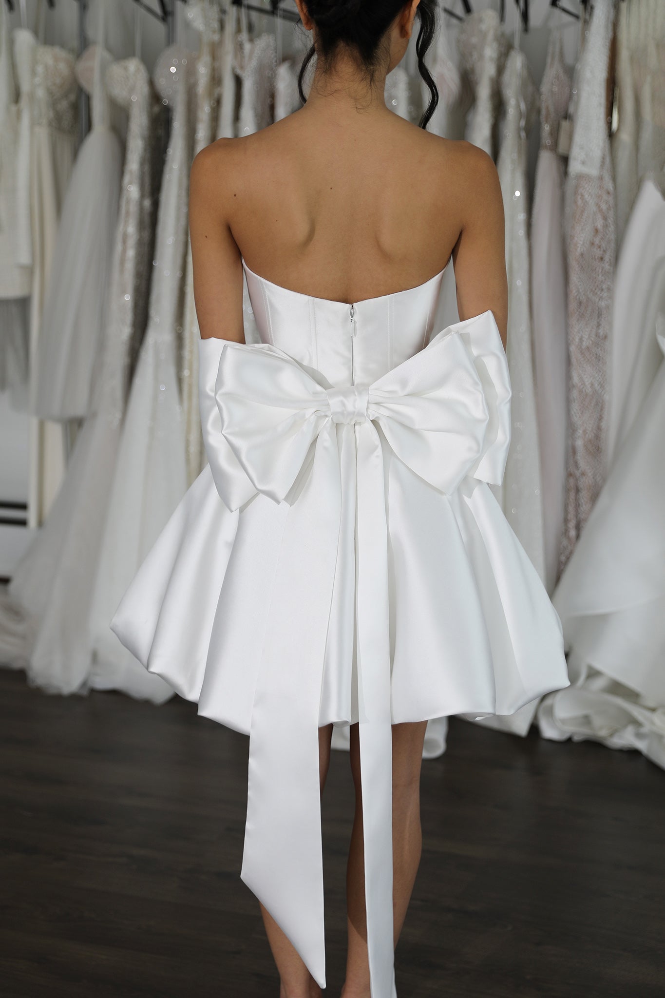 double bow with long tails on white mikado mini wedding dress