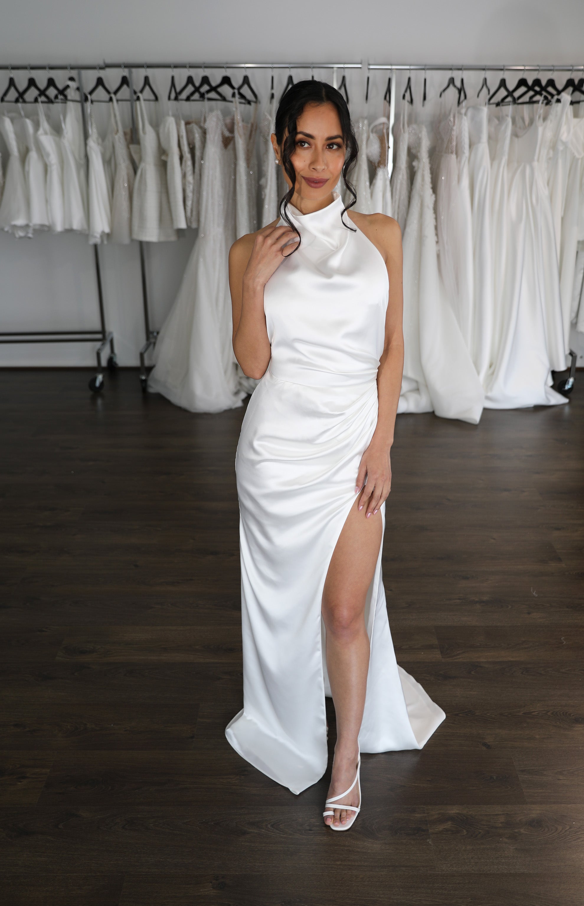 draped wedding reception gown with thigh high split
