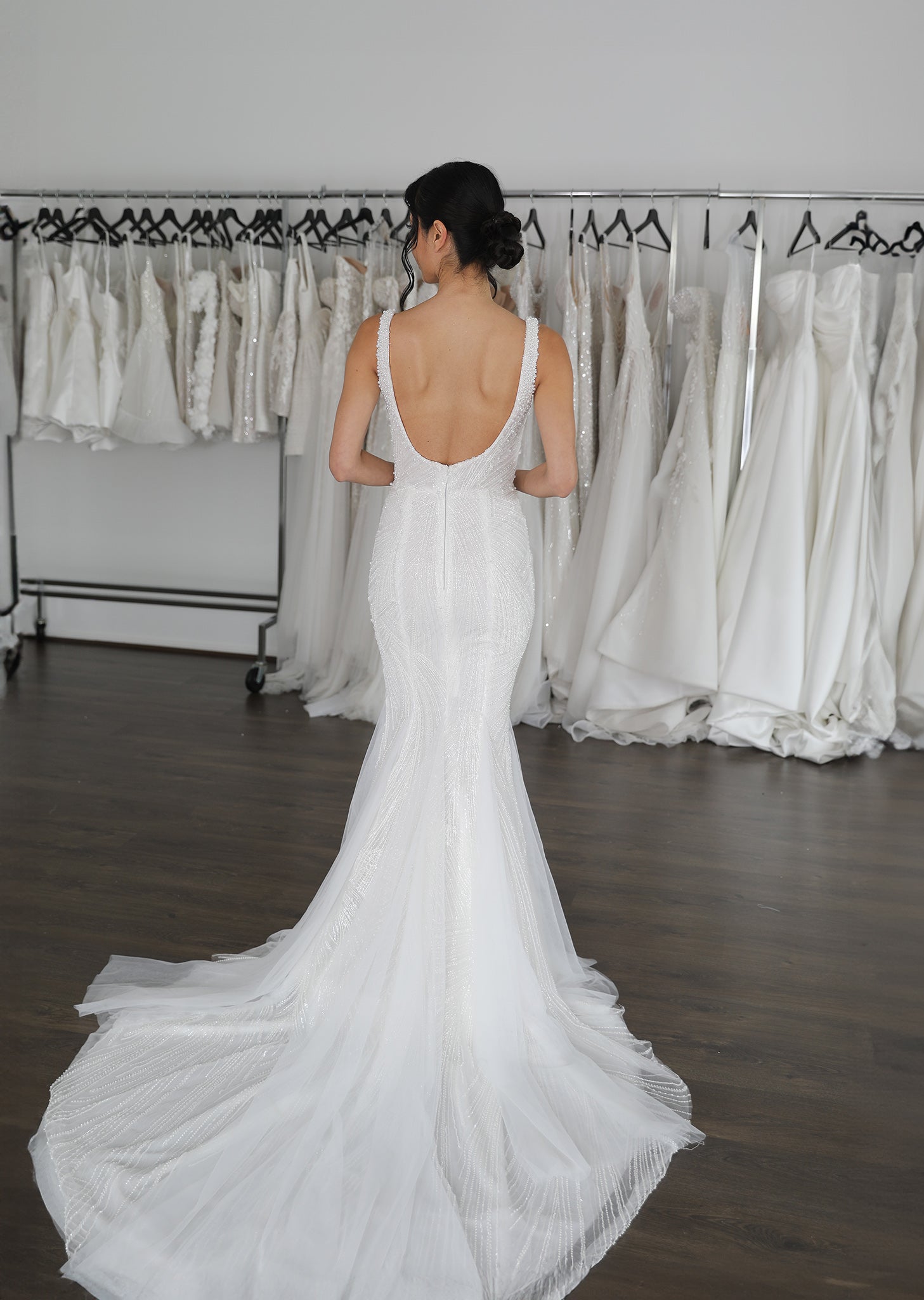 low u-back wedding dress with extended lace train and thin straps
