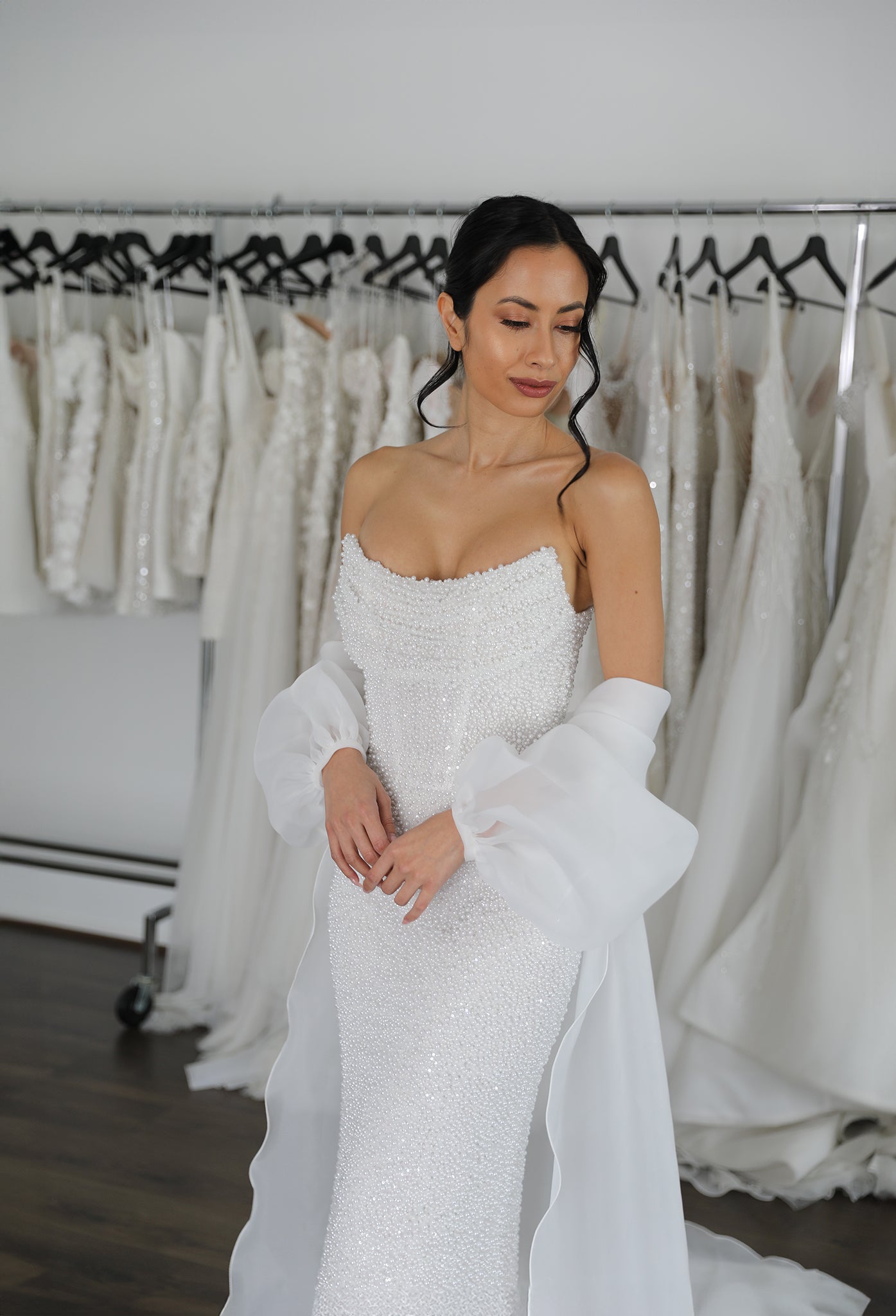 peal bust gown and organza cape