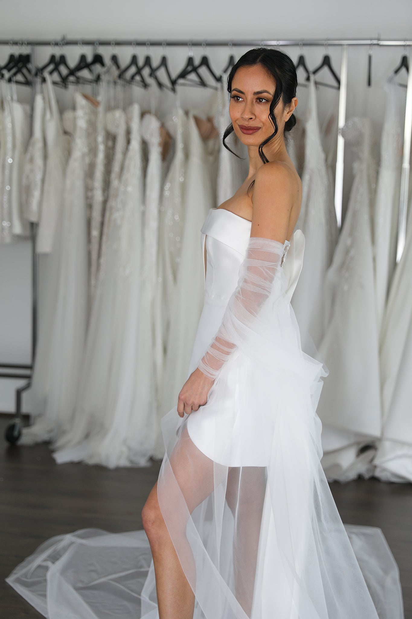 tulle bridal cape and mini dress on woman