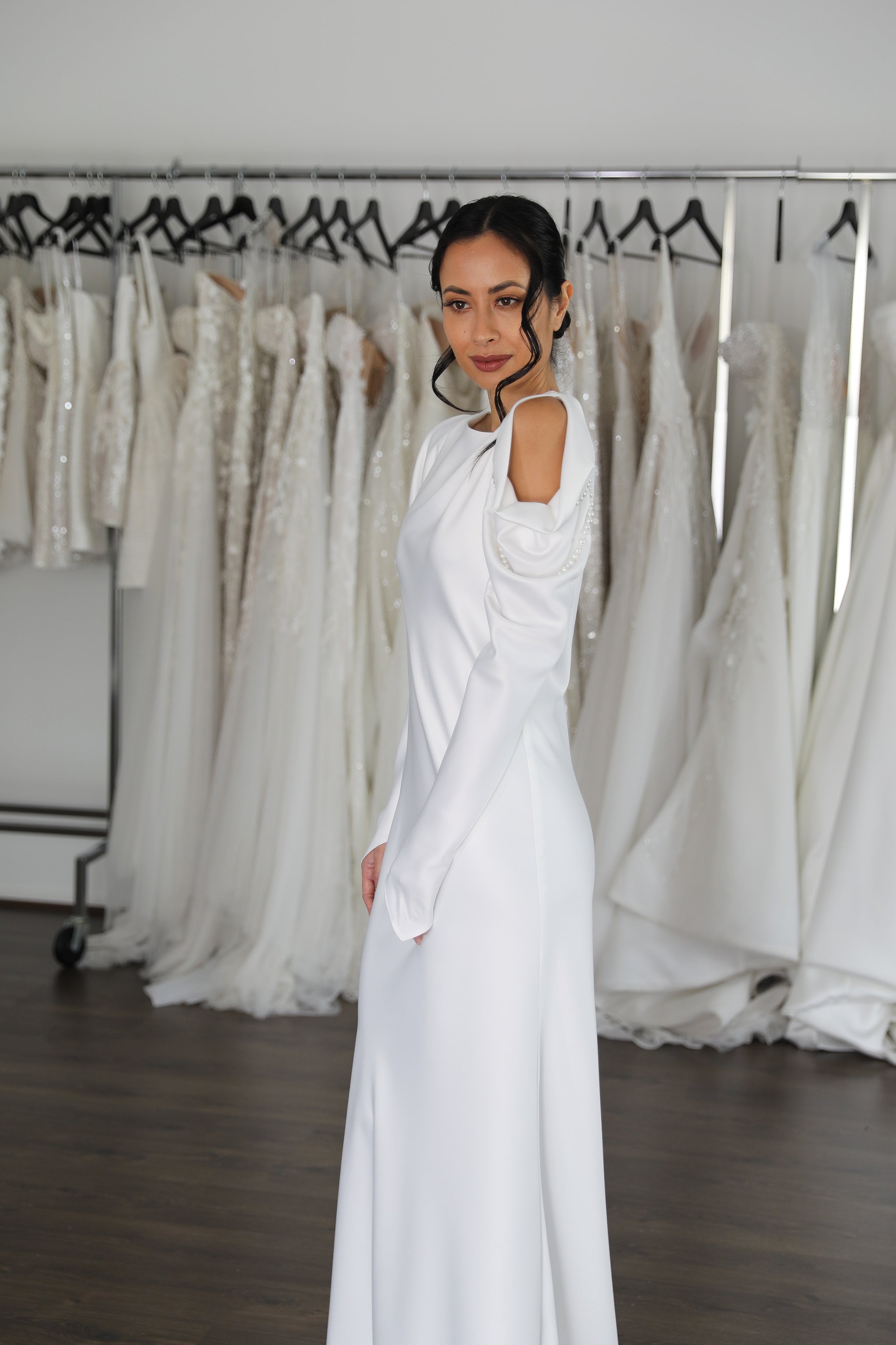 white long sleeve wedding dress with shoulder details