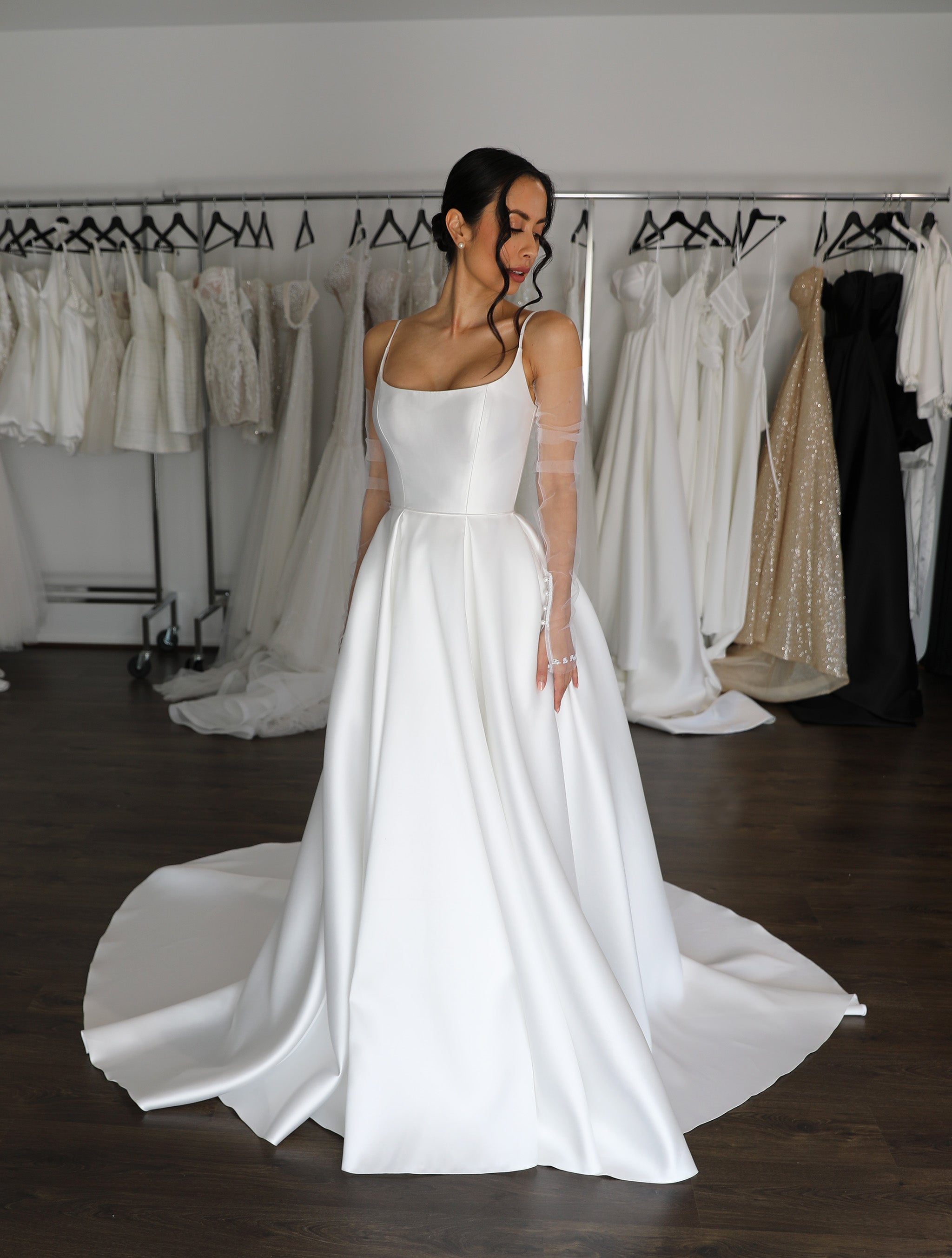 white mikado wedding dress with U-neckline and dramatic train with long tulle gloves