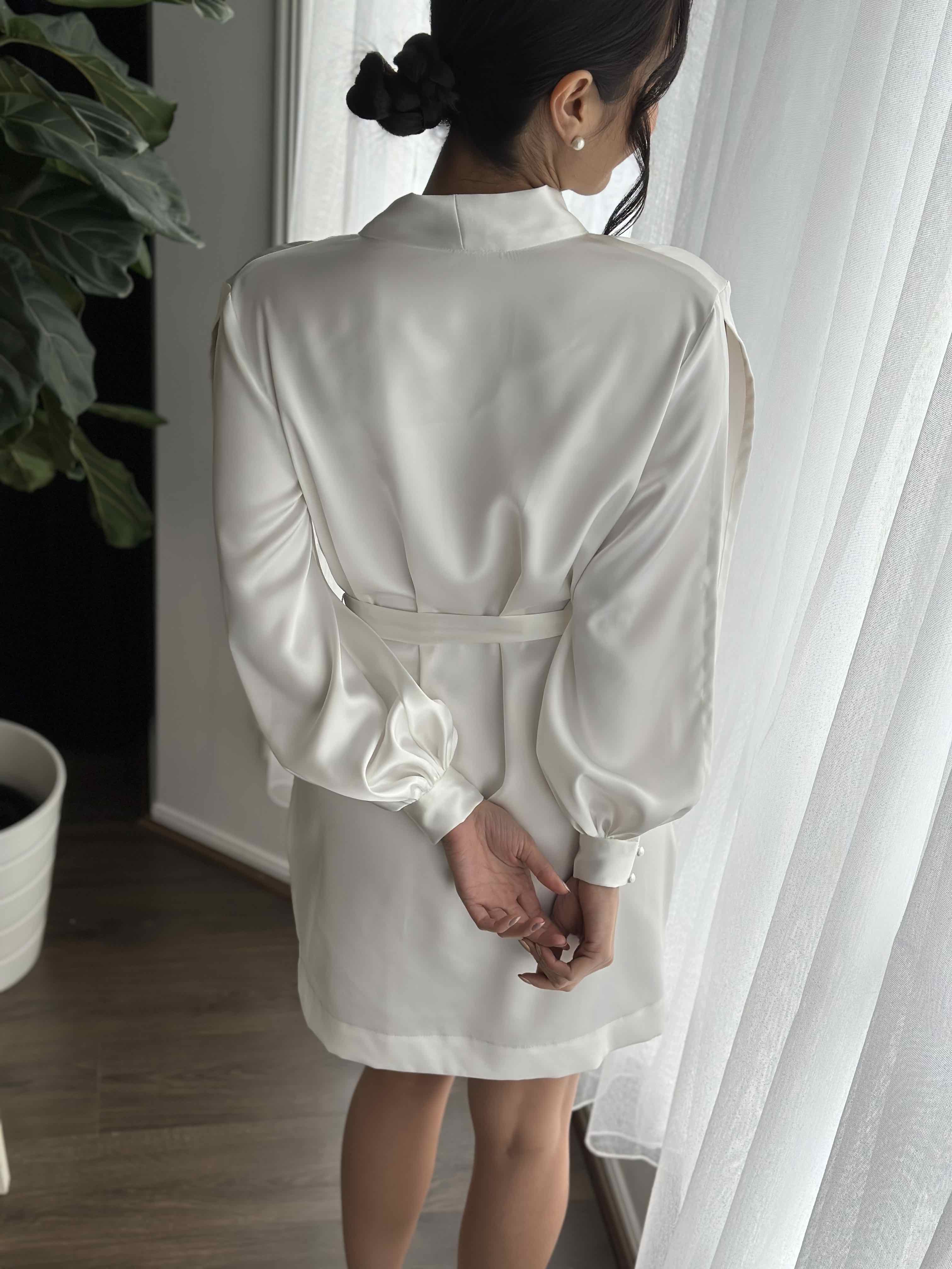 woman in ivory bridal robe