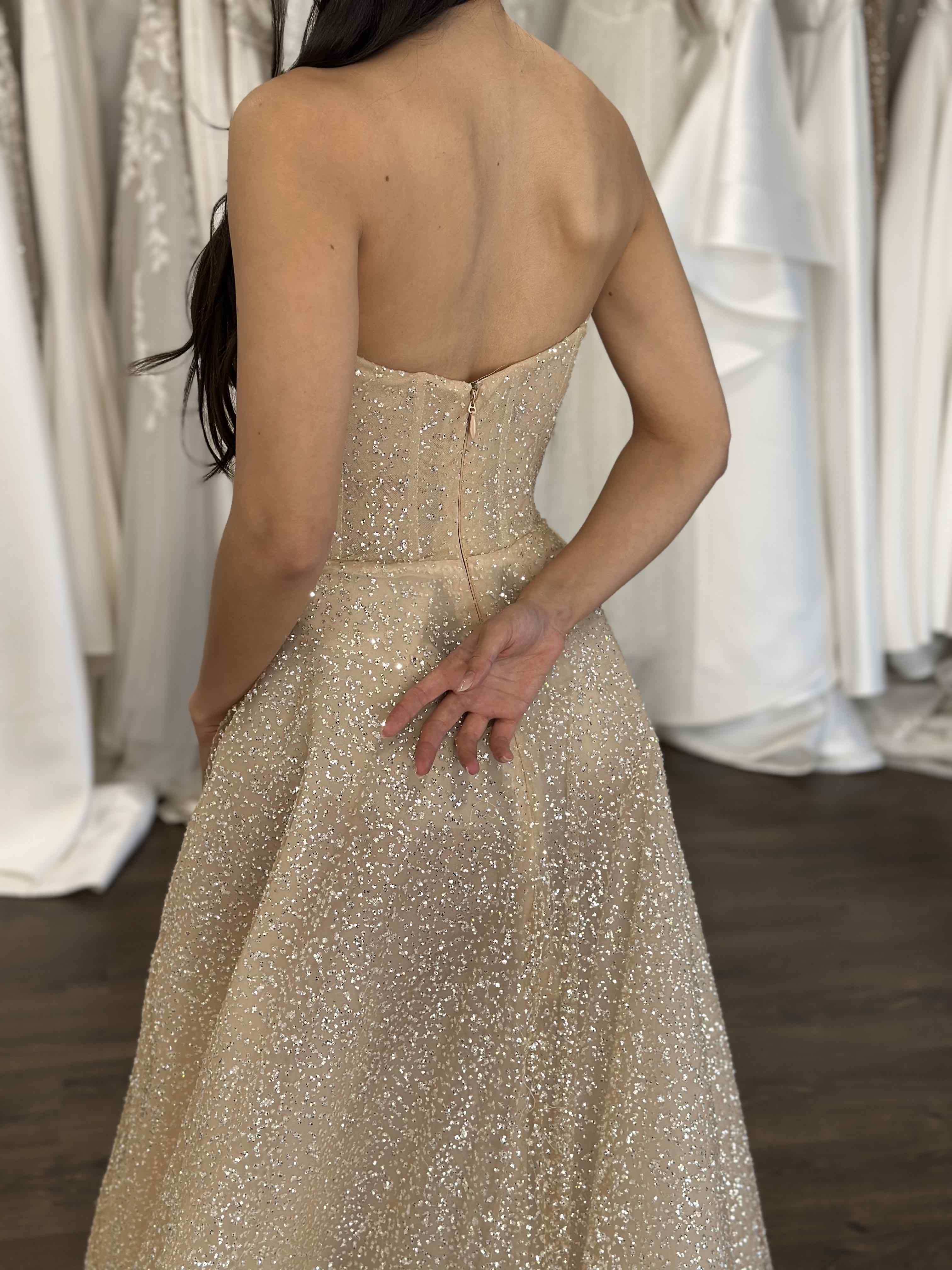 back detailing on champagne glitter formal dress