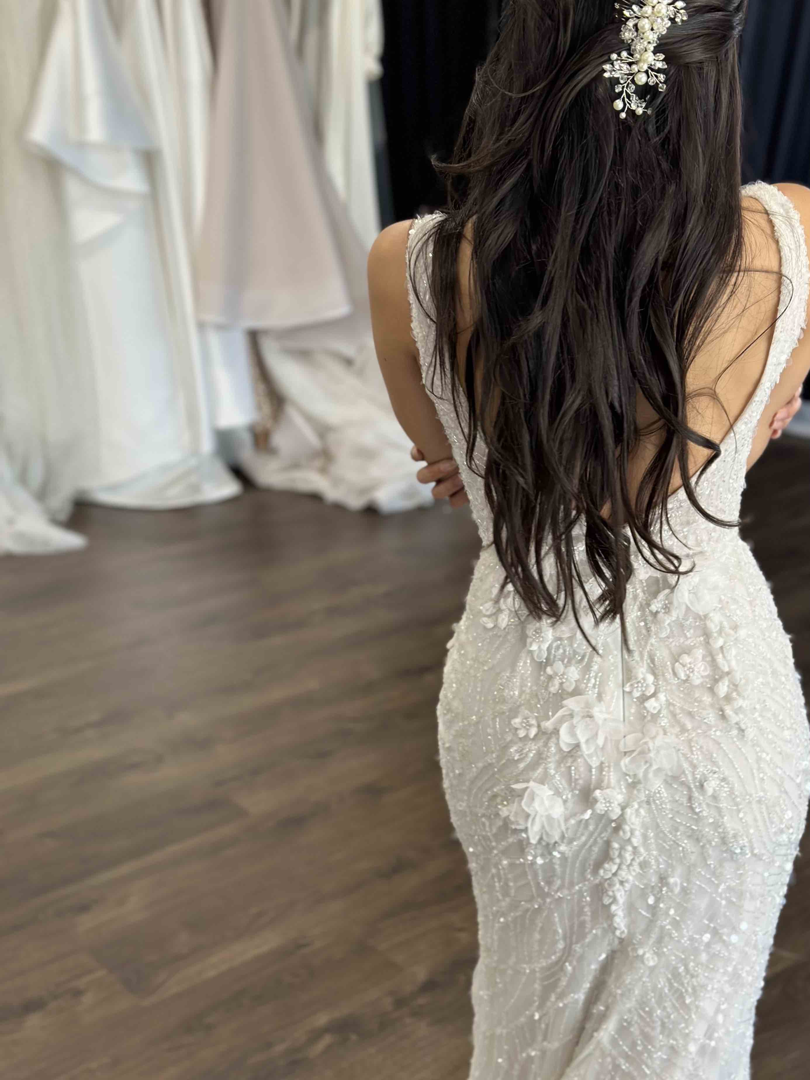 back detailing on white beaded wedding gown