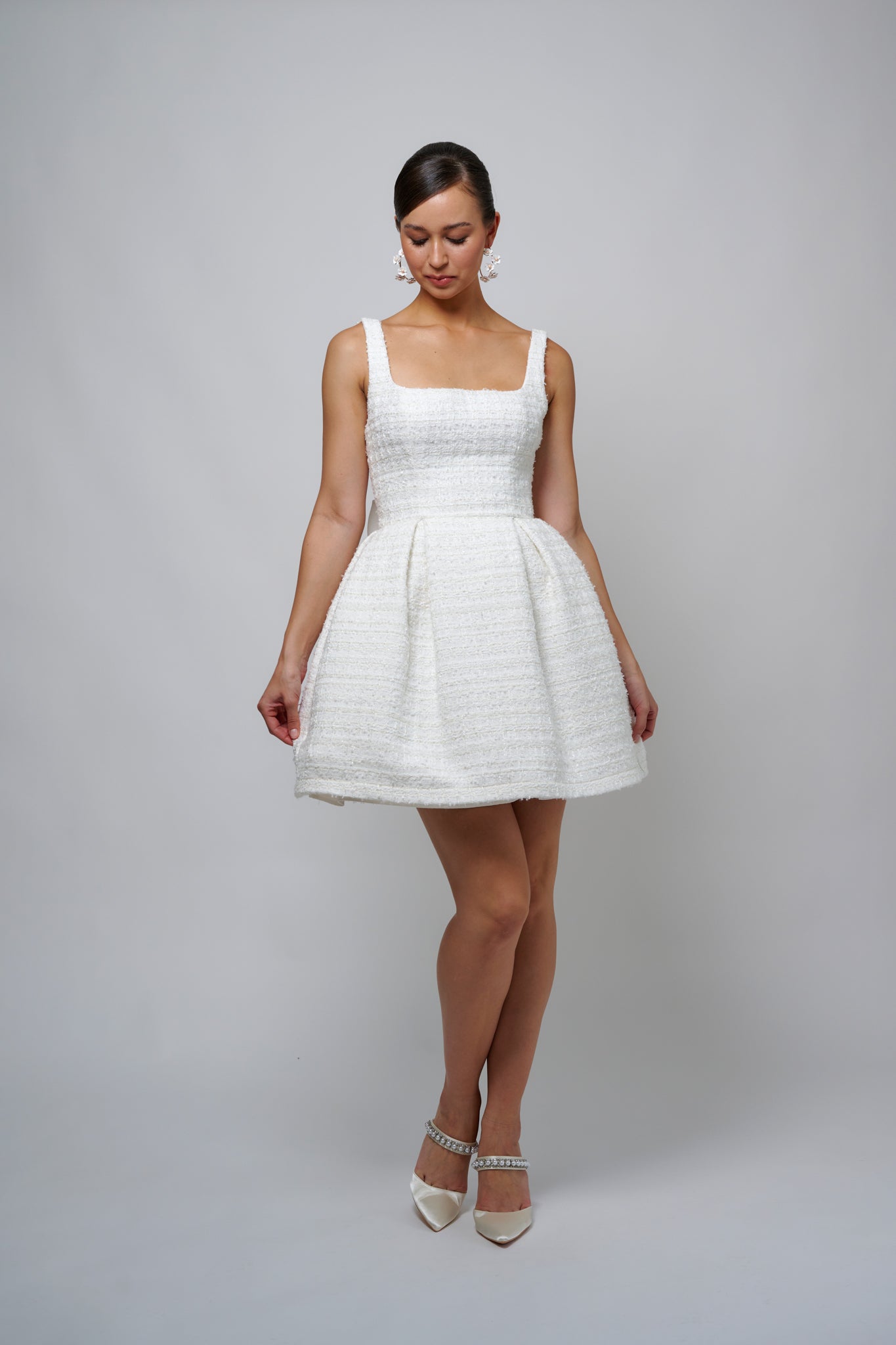 bride in a U-neck wedding gown