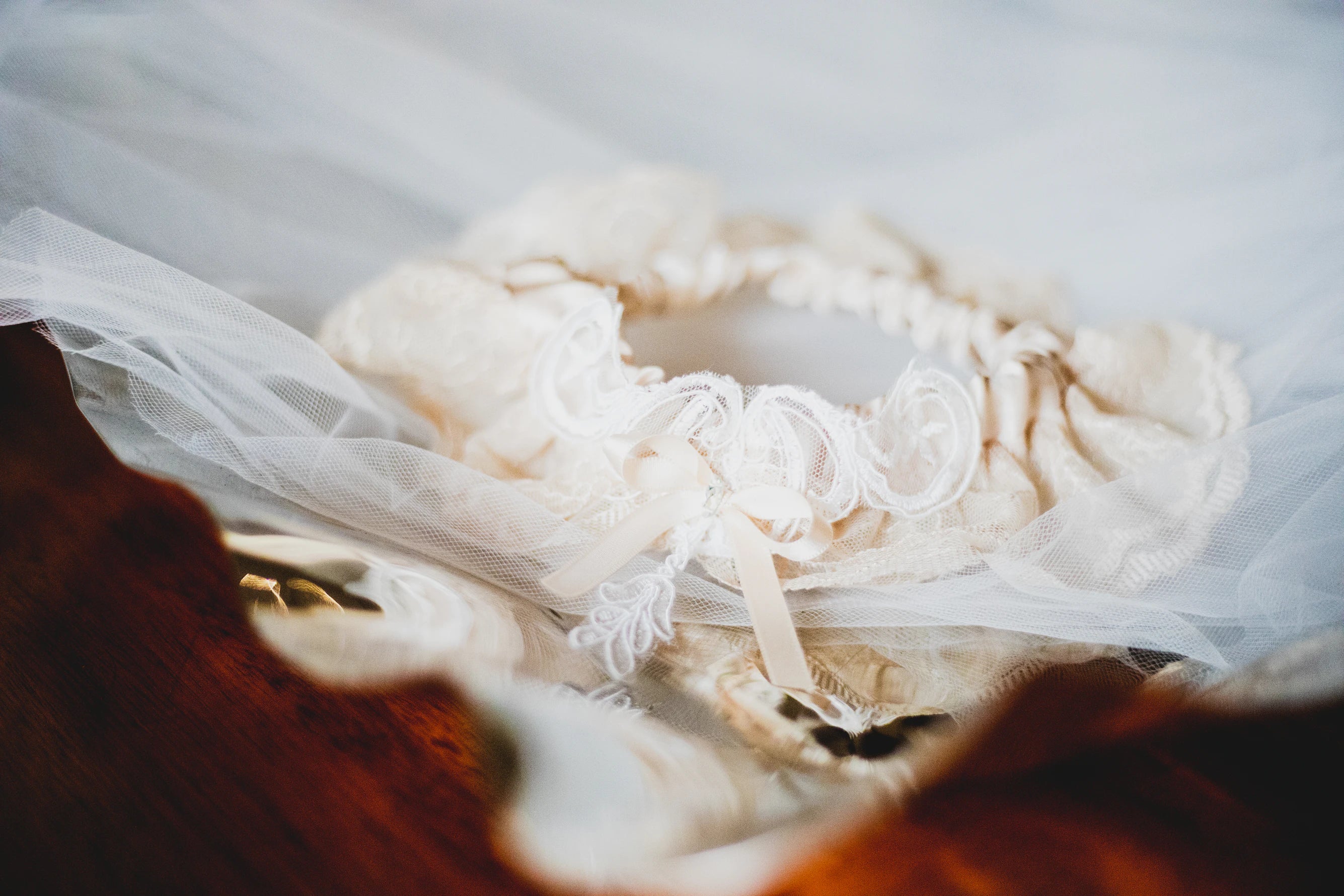 The History Behind the Bouquet & Garter Toss - Arkansas Bride
