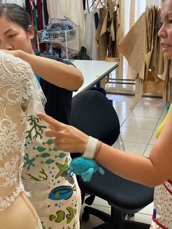 seamstresses hand sewing a custom made wedding dress at Brisbane bridal studio