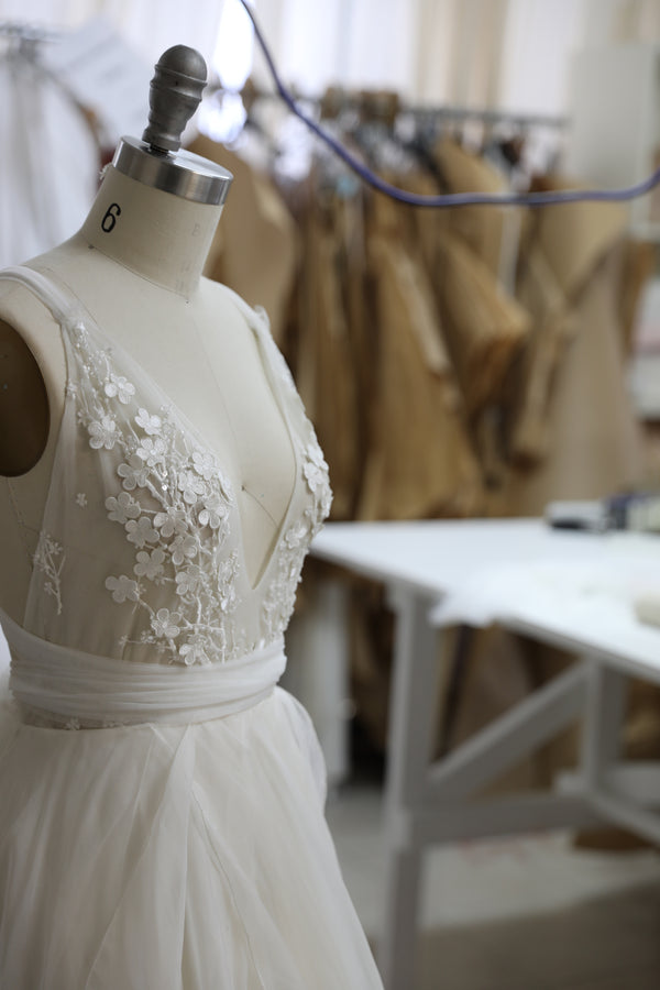 wedding dress on dress form at custom dress studio