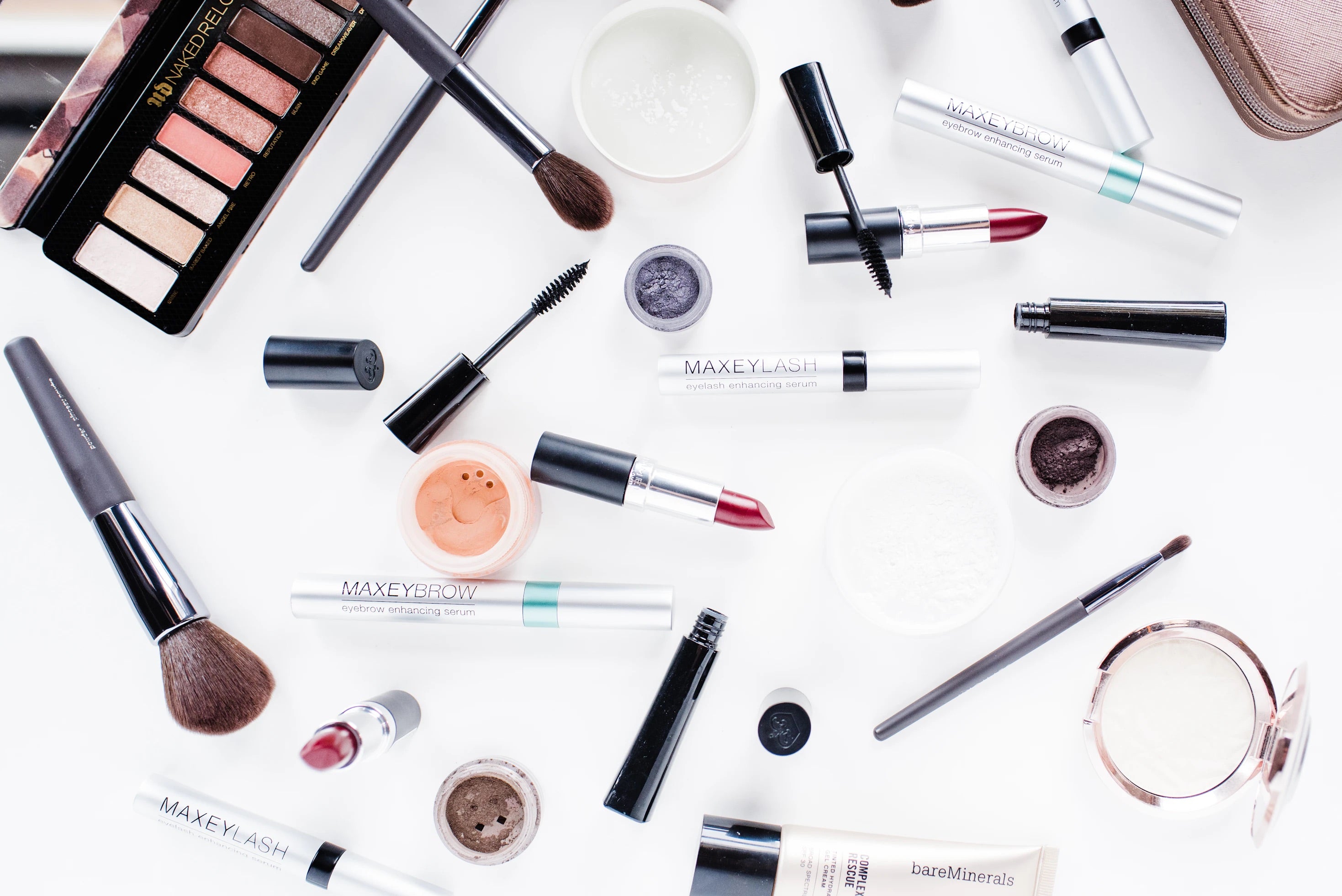 white table full of makeup products