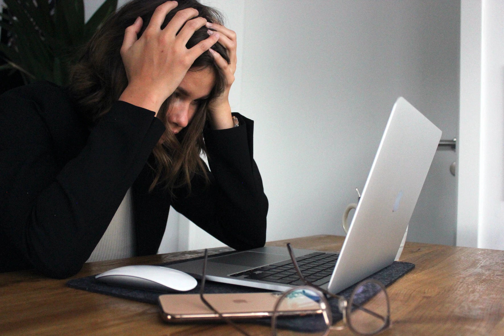 woman stressed staring at laptop