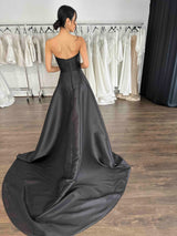back view of woman in black mikado evening dress