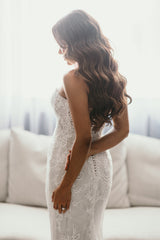 beaded lace wedding dress on brides body