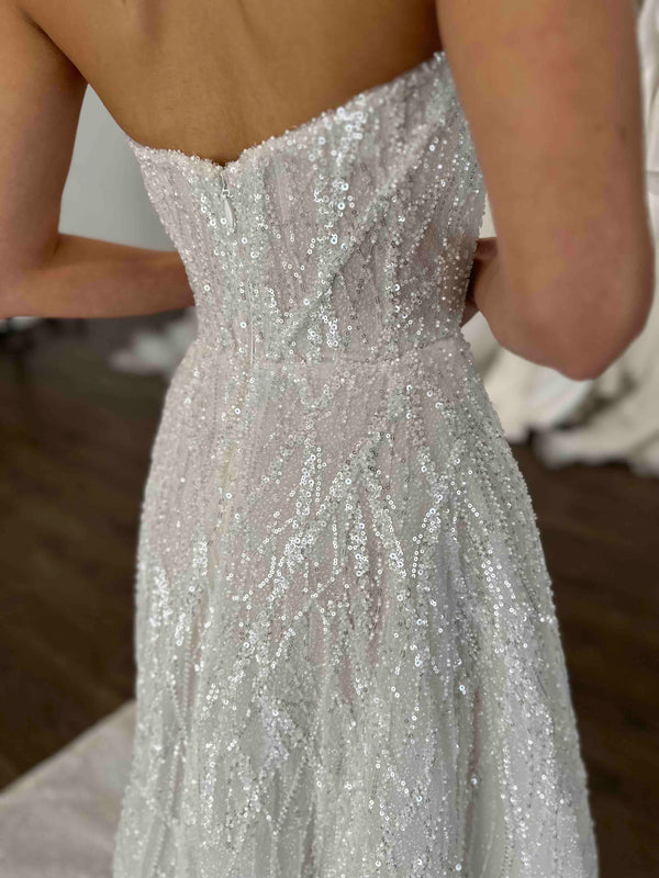 beaded lace wedding dress with strapless design feature