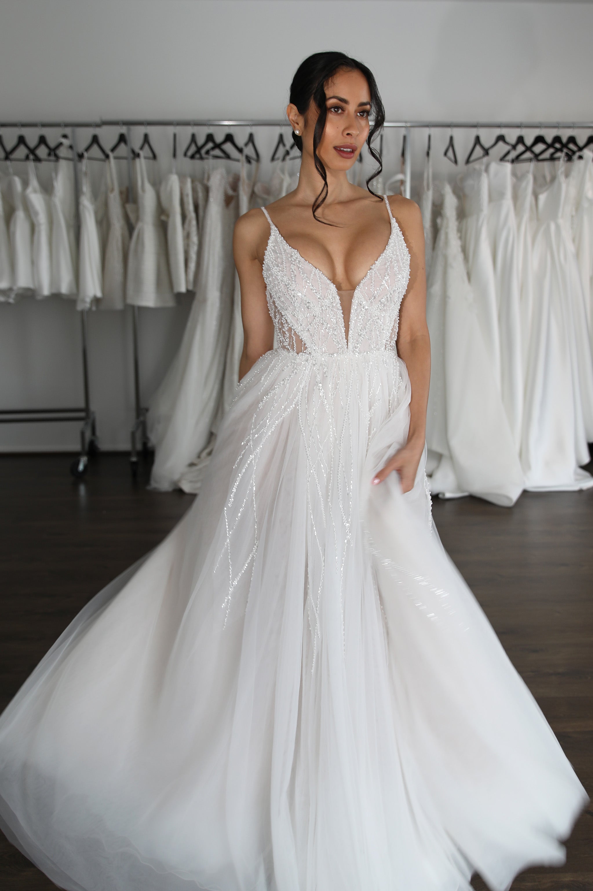 beaded lace wedding dress with v-neck and flowing tulle skirt