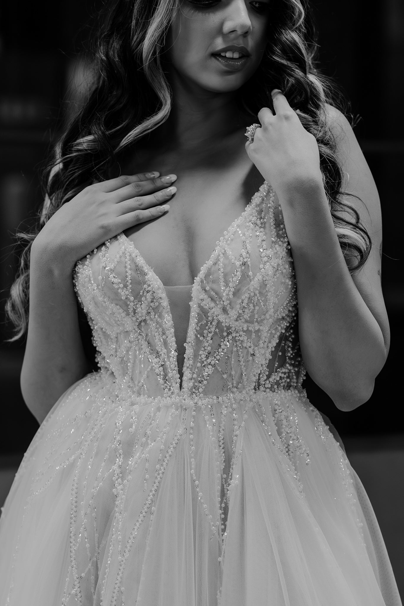 beaded lace wedding gown on brunette woman