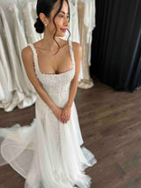 beaded lace wedding gown with pearl and tulle inserts