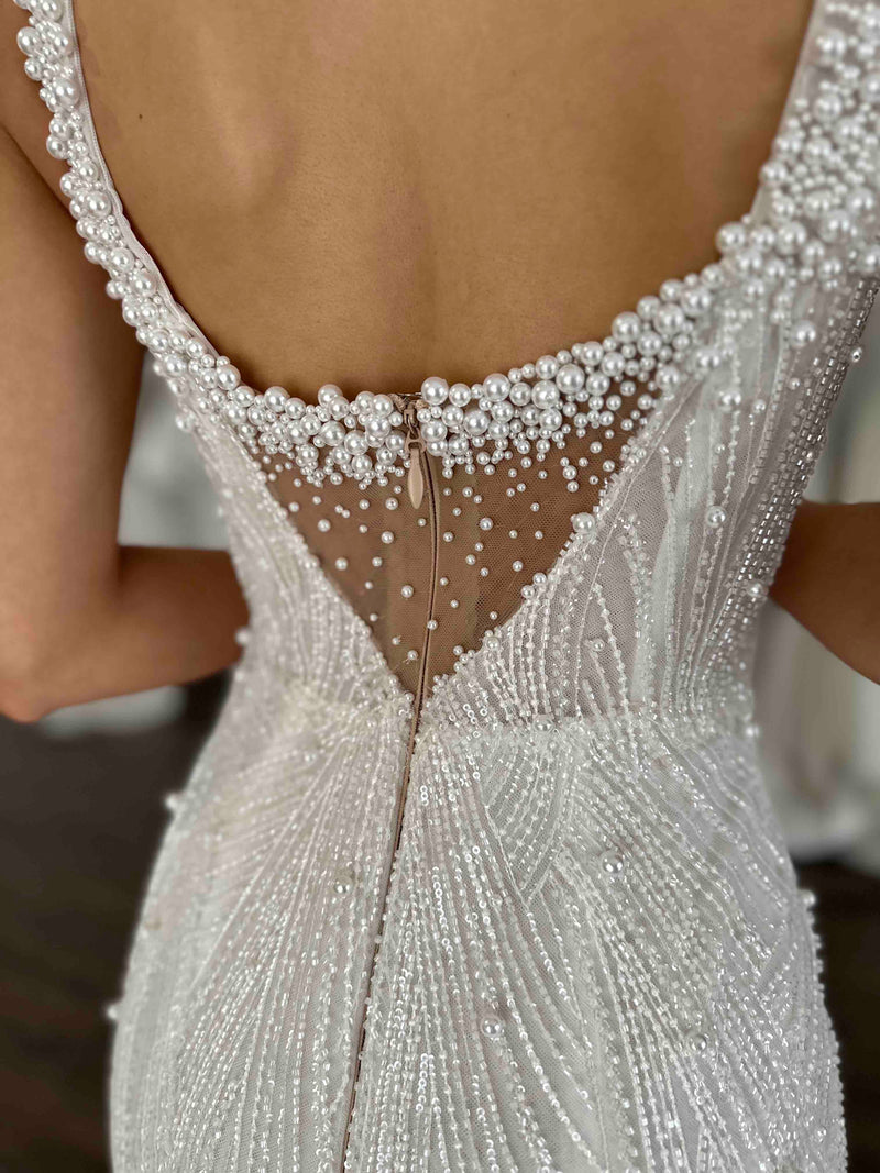 beaded wedding dress covered in pearls