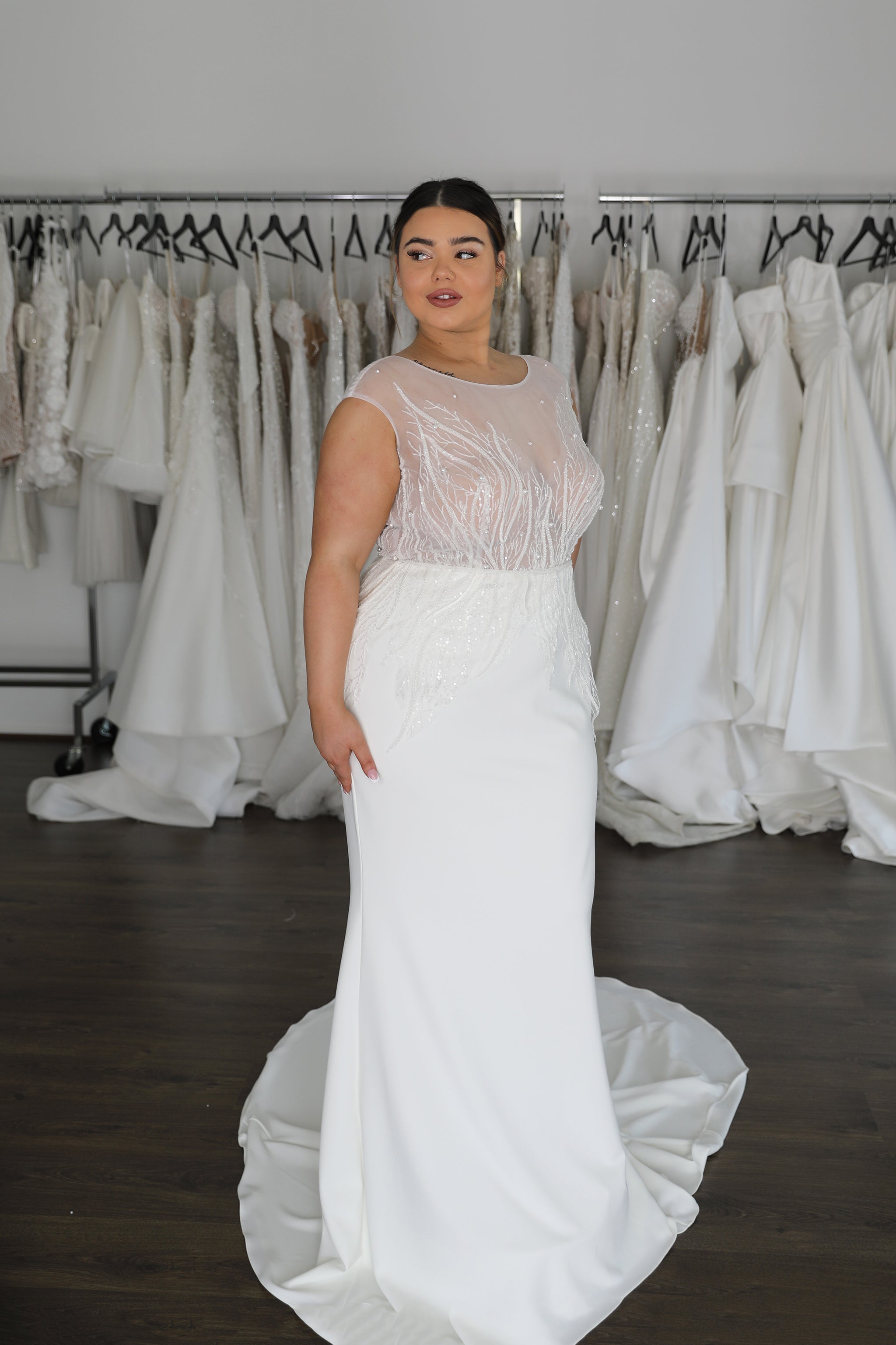 bridal gown with illusion top featuring vine lace