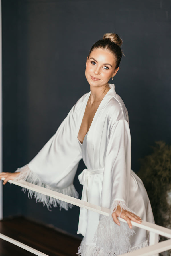 bridal robe with feather sleeves