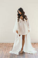 bridal slip dress and flowing feather robe