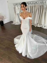 bride in her beaded gown with mermaid skirt