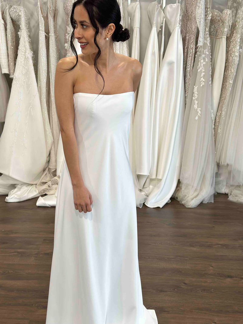 bride in white strapless slip wedding gown