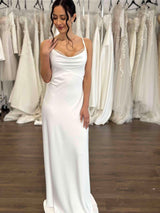 bride wearing cowl front slip dress with pearl lace inserts in bust area