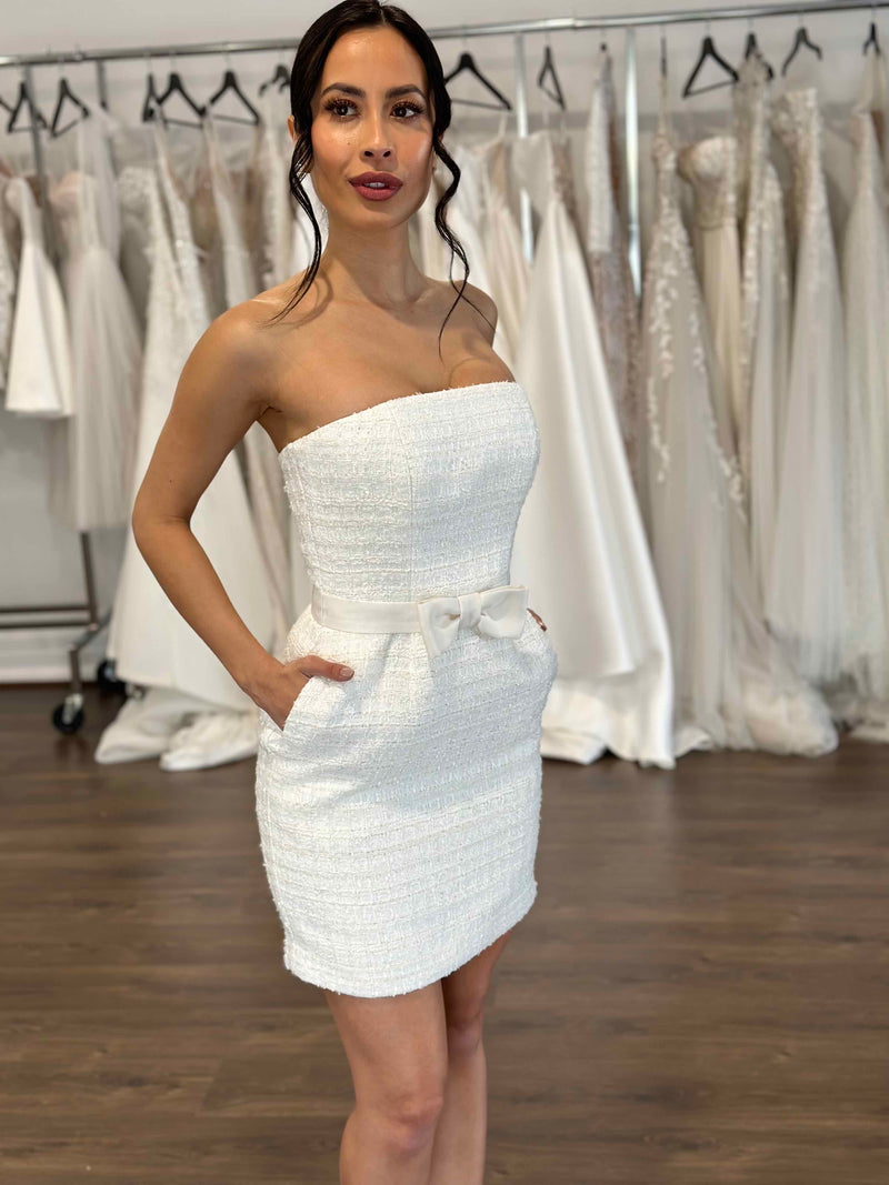 bride wearing luxurious bridal mini gown