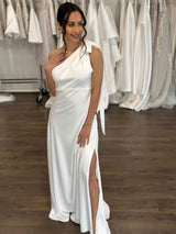 bride wearing one shoulder white slip dress