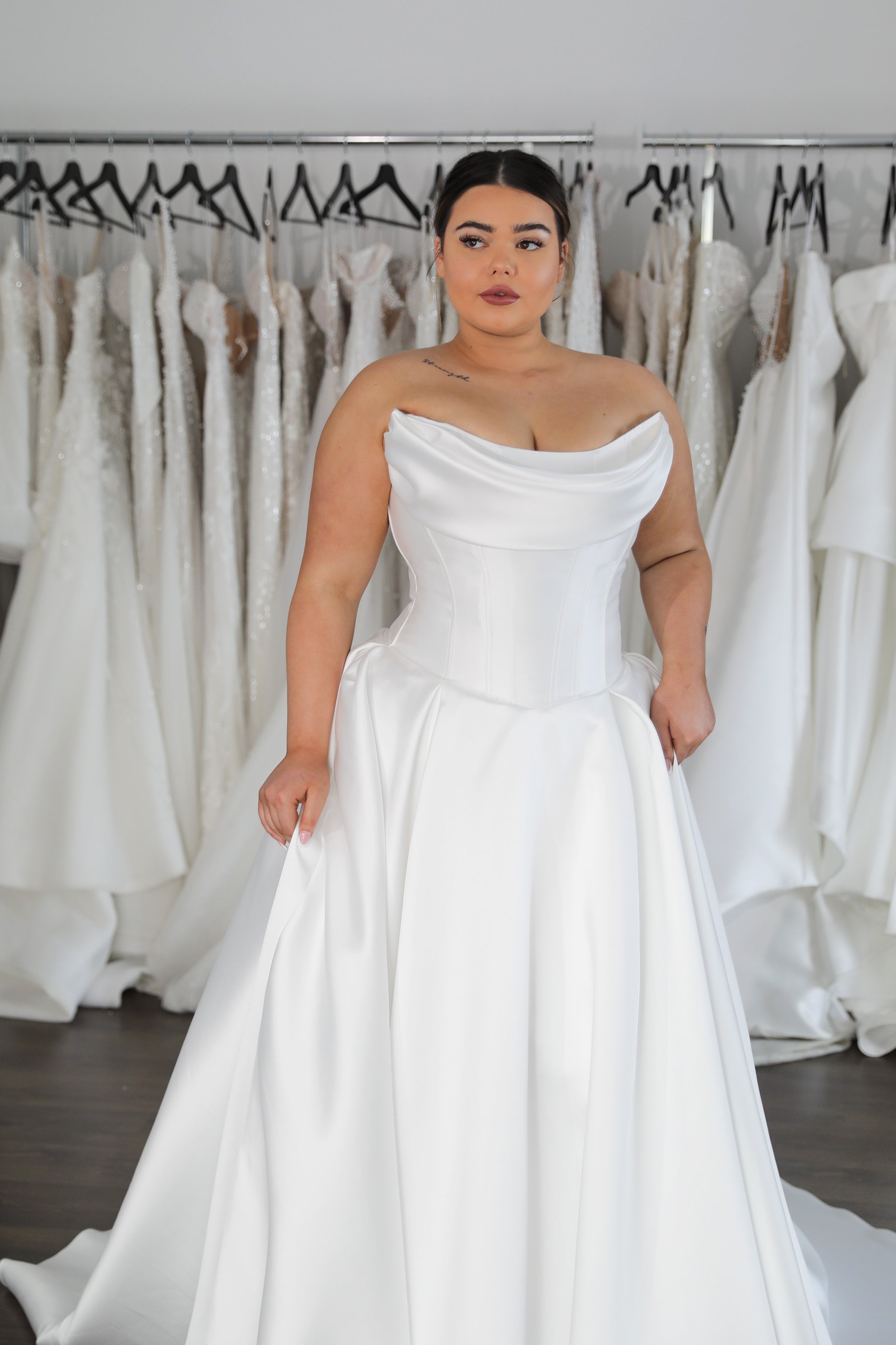 bride wearing scoop neck wedding dress with drop waist