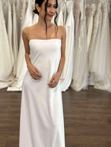 bride wearing white strapless wedding slip gown