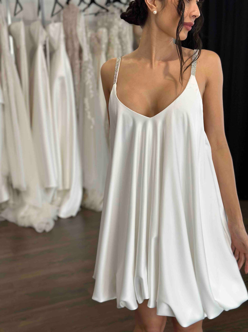 bubble hem mini dress with detailed straps