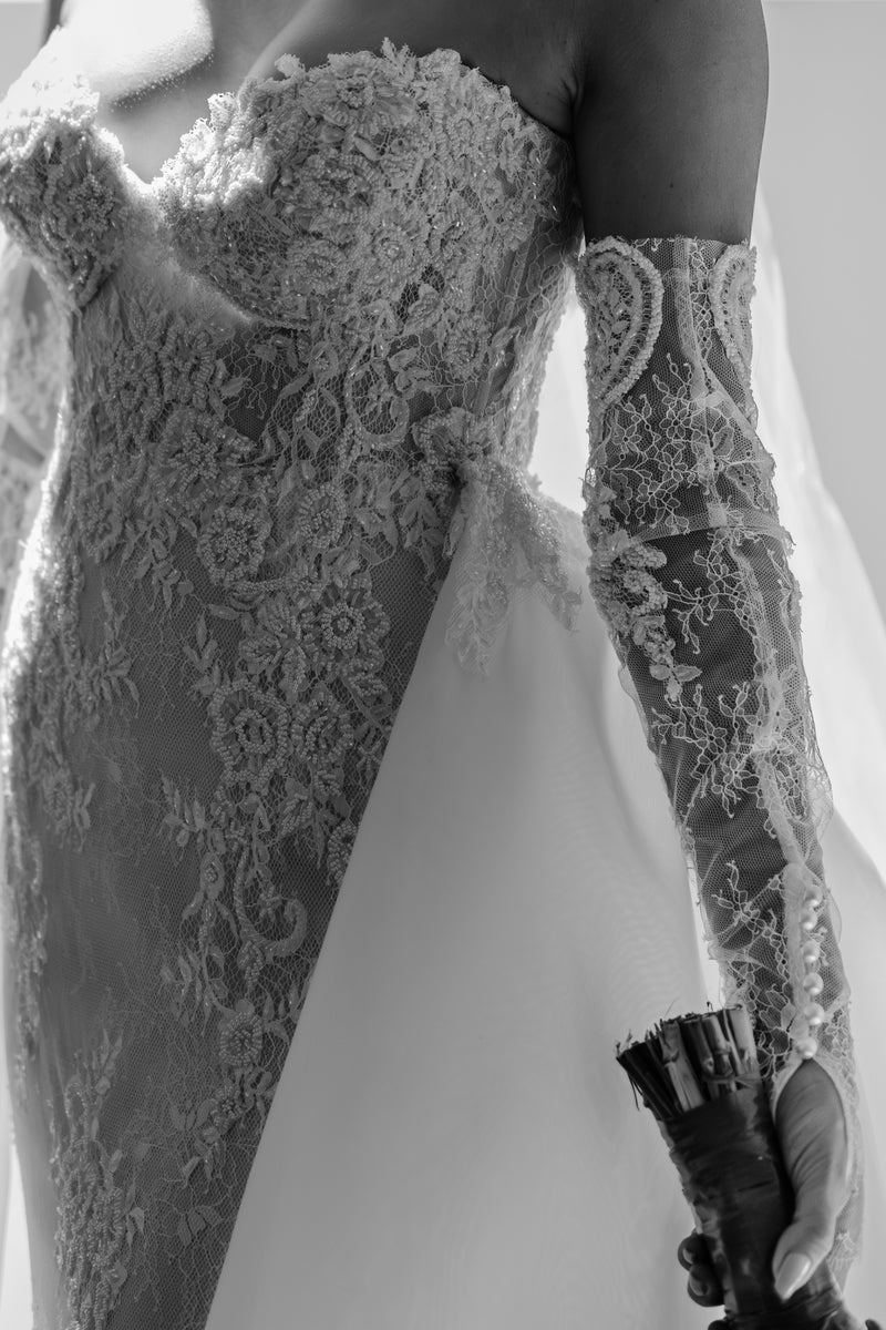 close up lace details on couture wedding dress