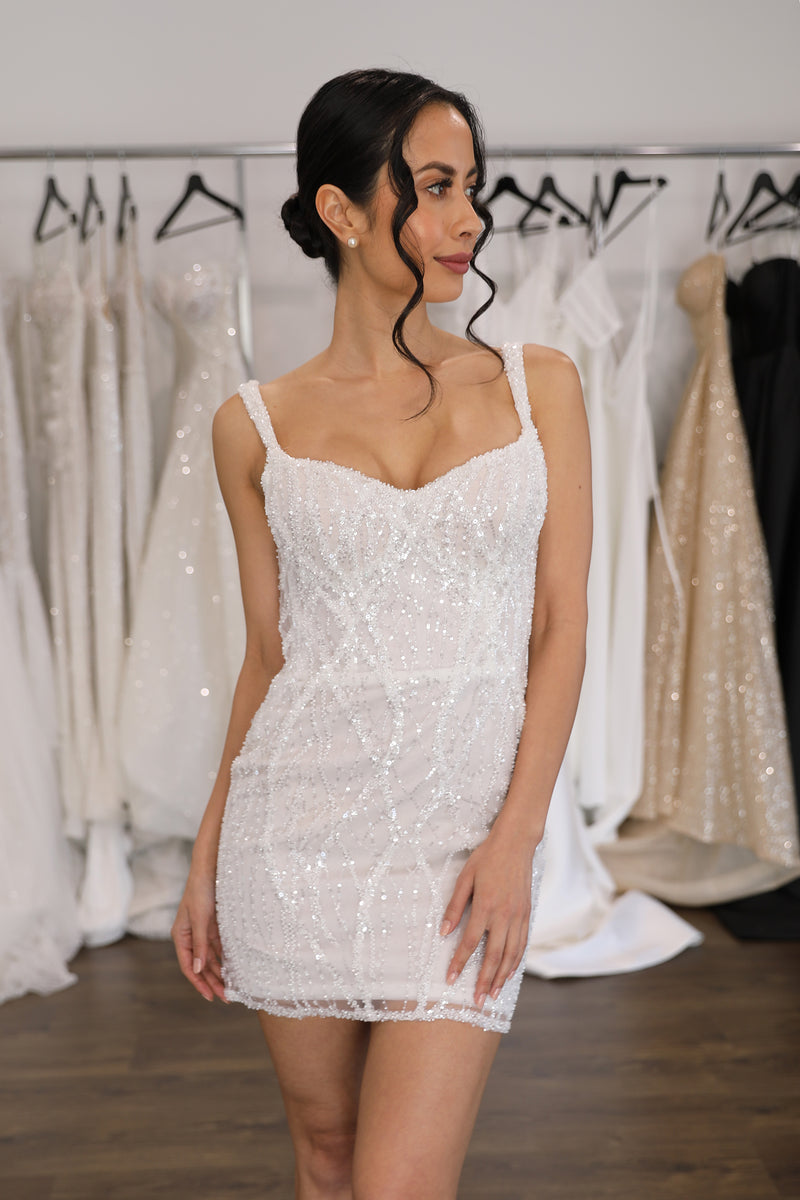 couture mini wedding dress on woman