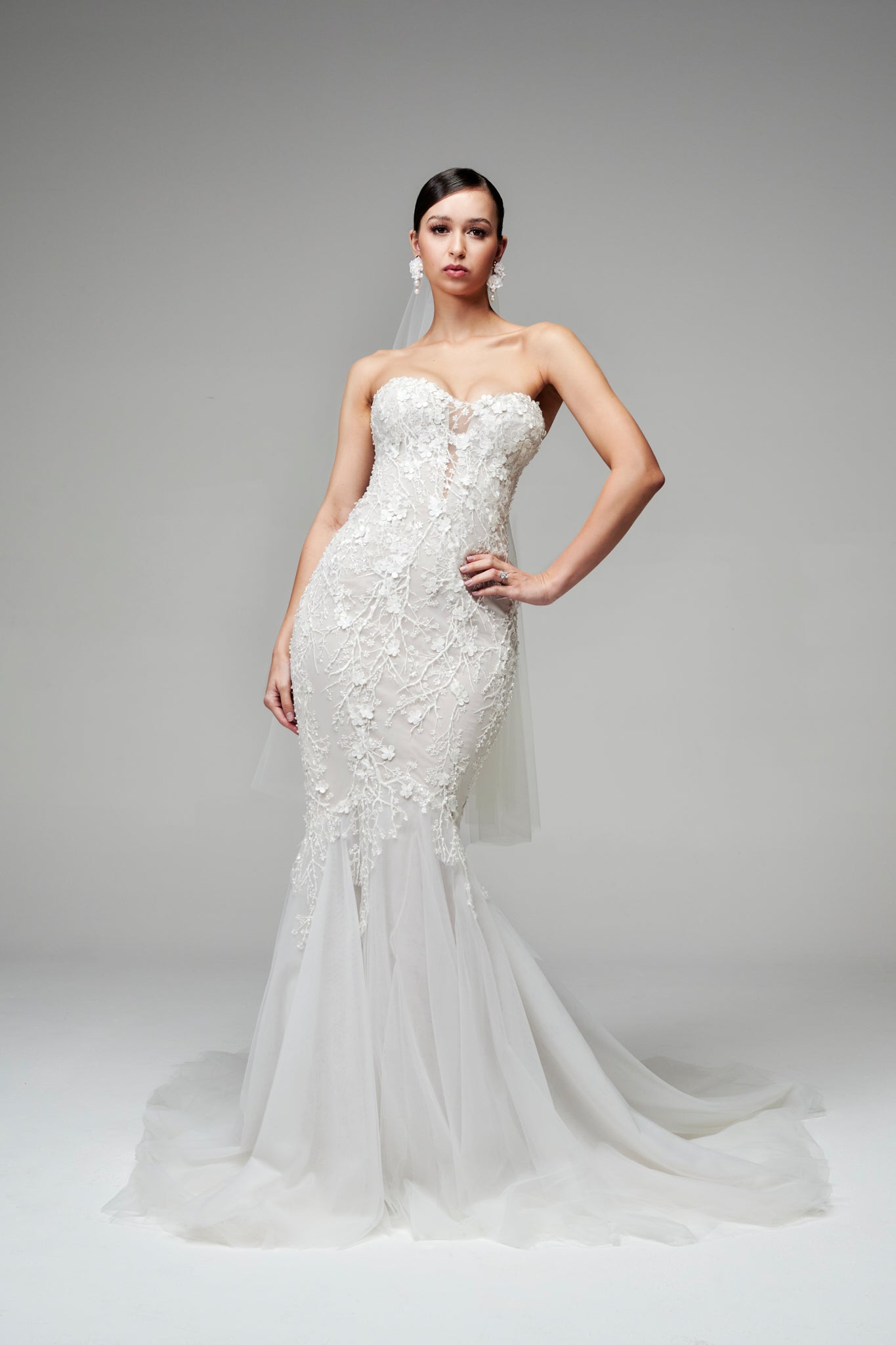curved neckline and fitted mermaid skirt on bride