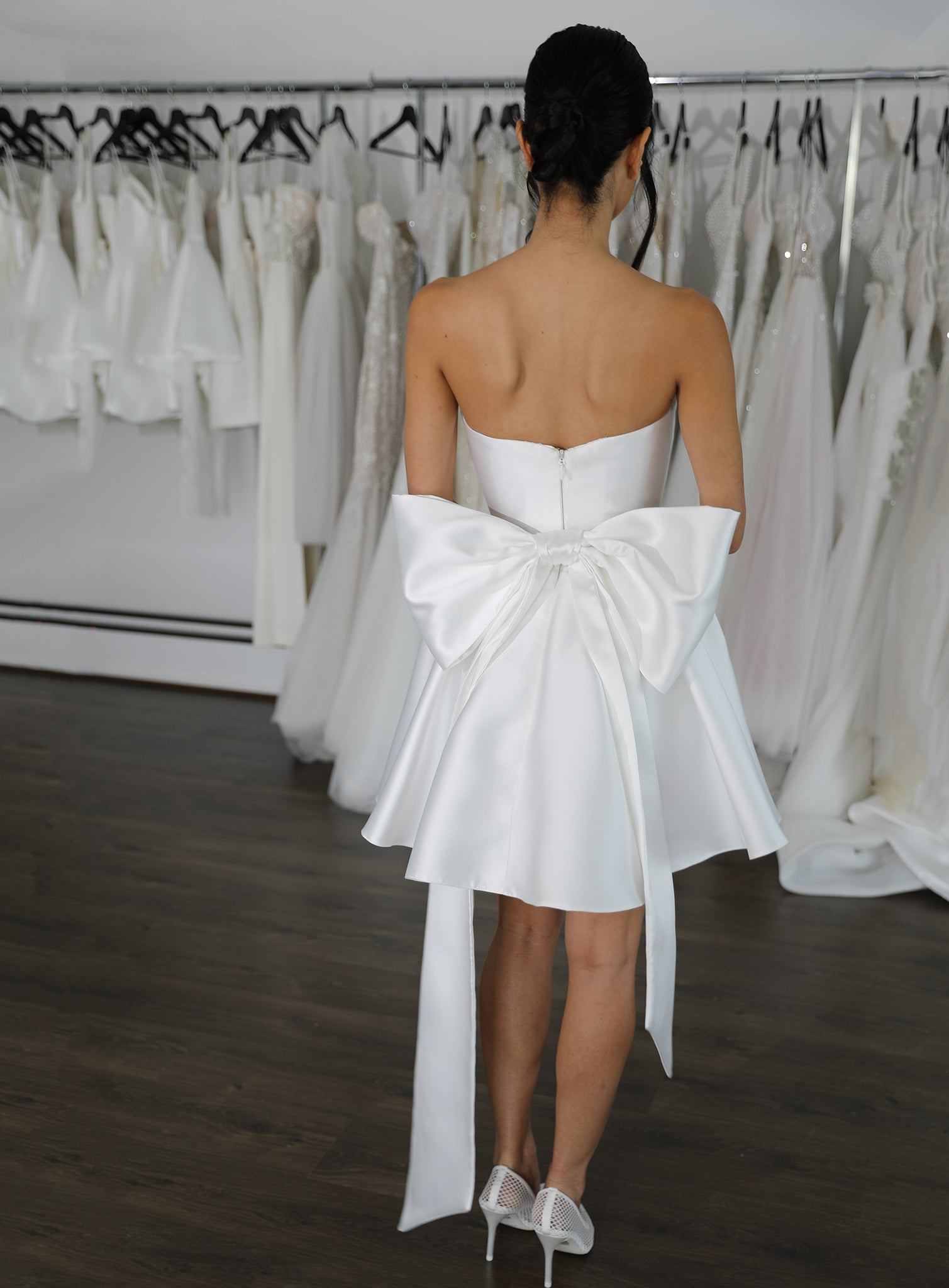detachable bow on mini wedding dress with low cut back