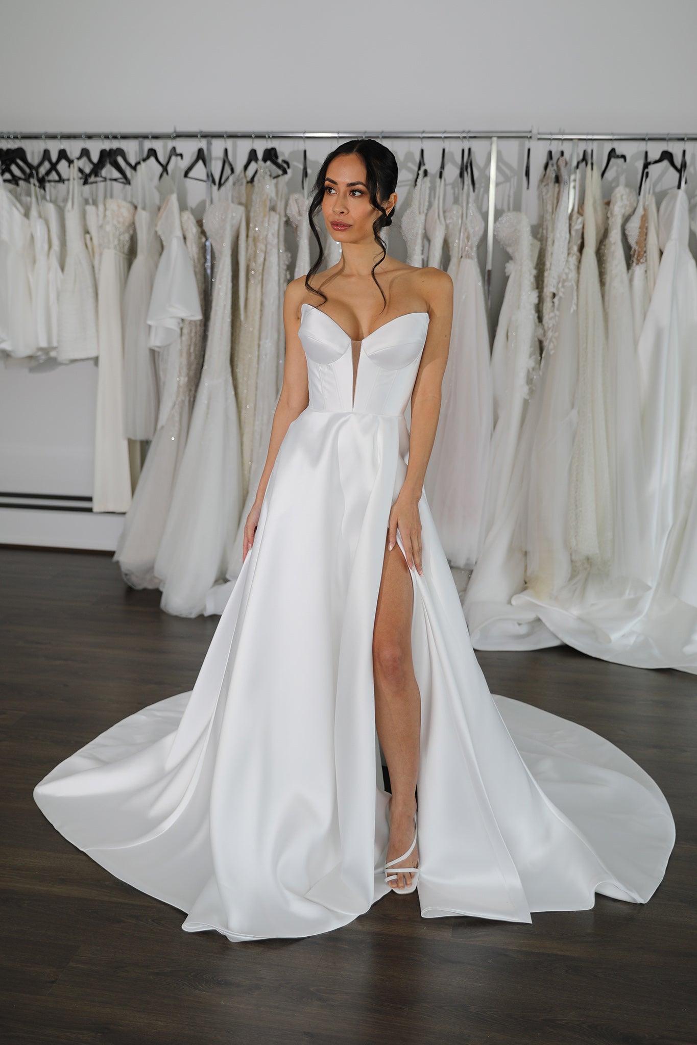 dramatic white wedding gown made from mikado with thigh high slit
