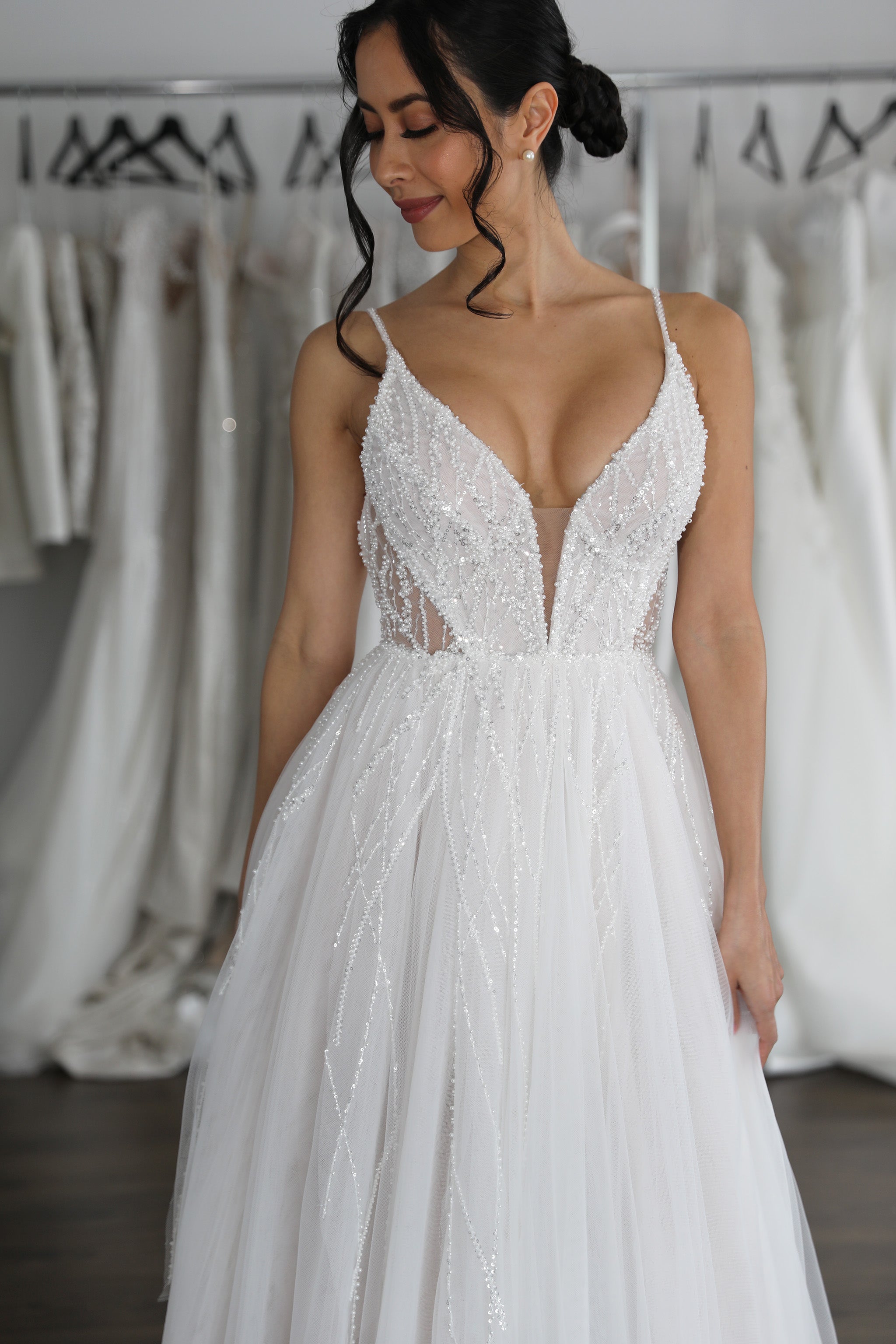 elegant lace wedding dress with deep v-cut neckline