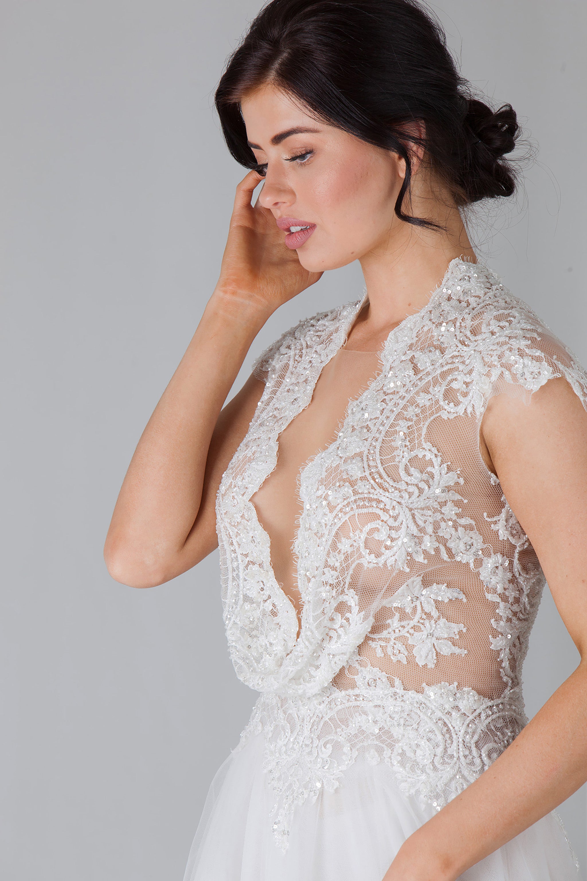 embroidered lace top of wedding ensemble