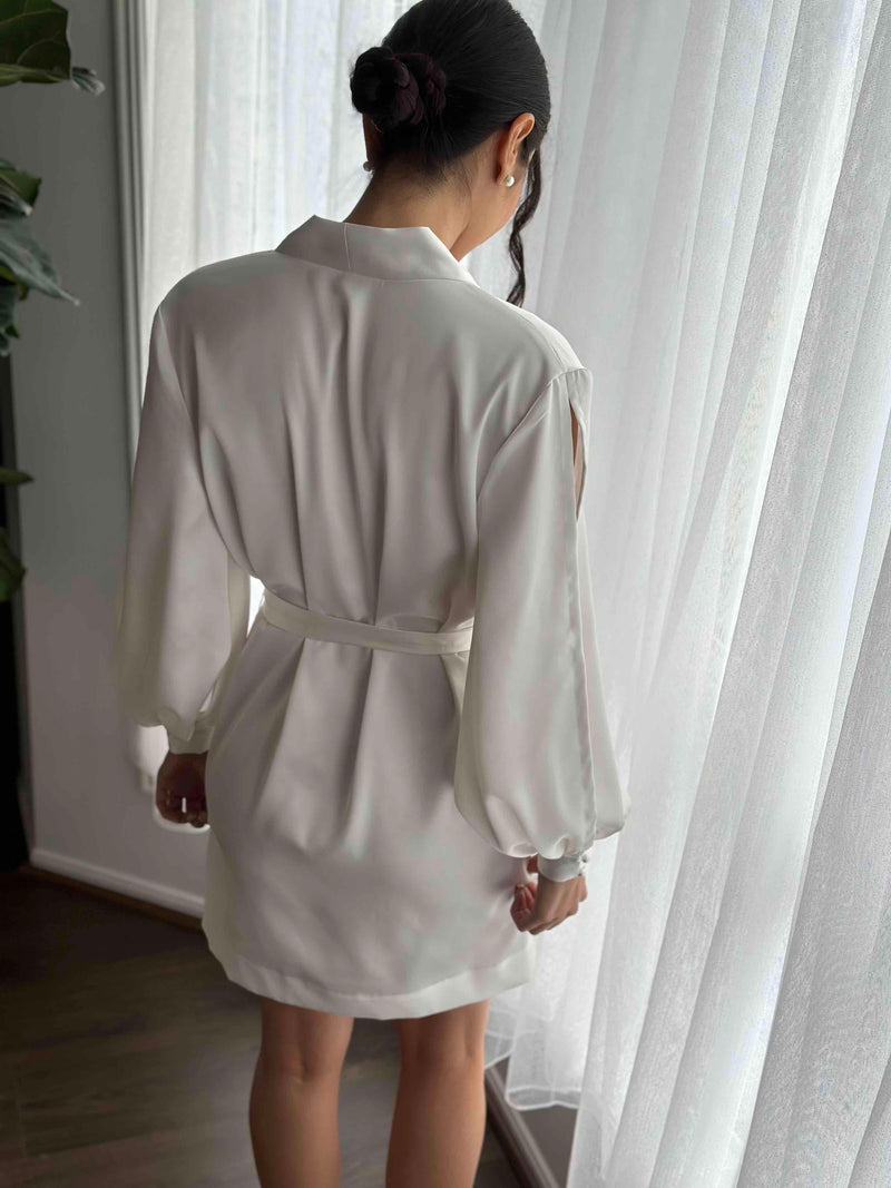 ivory knee length robe with long sleeves